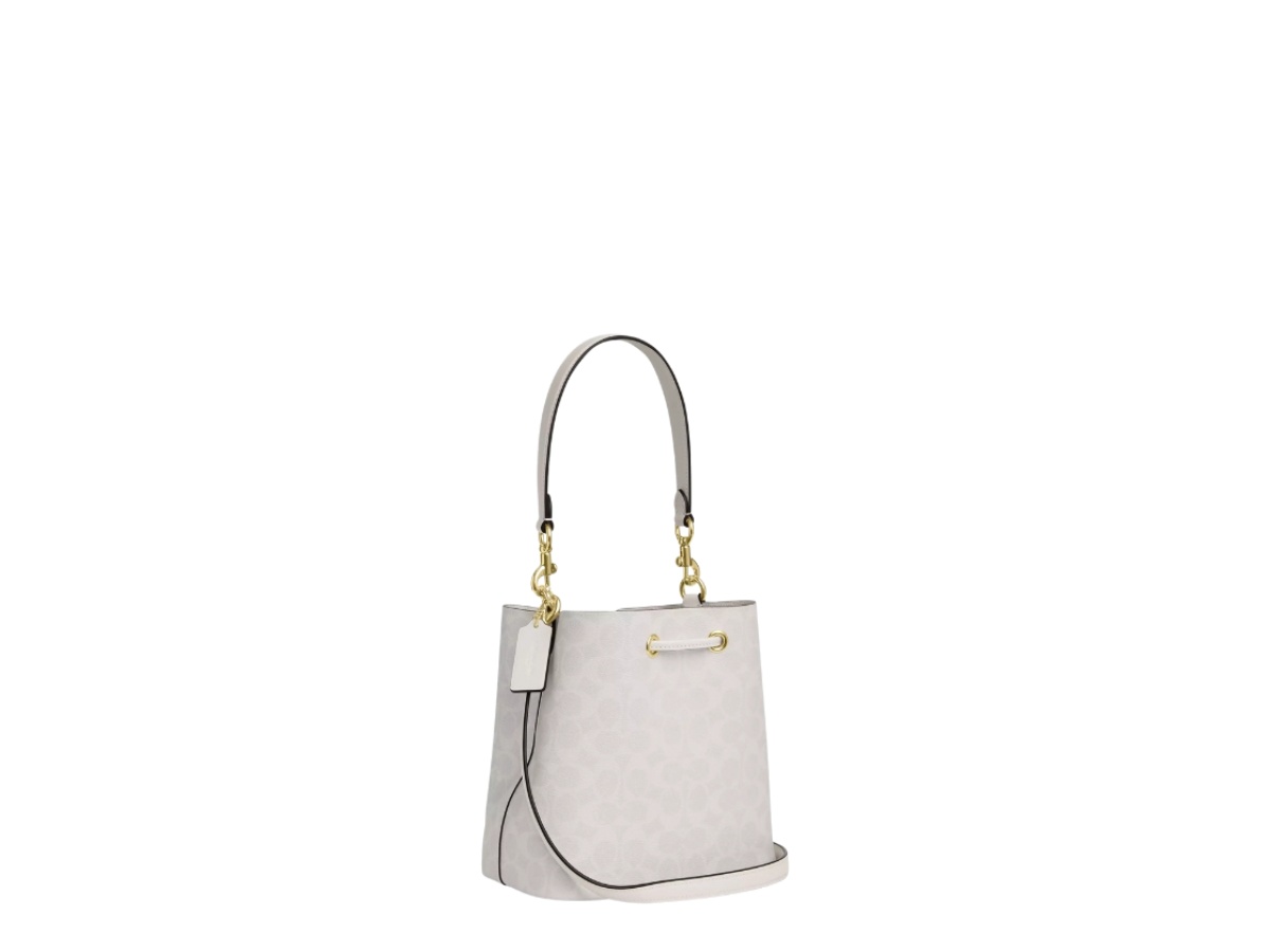 https://d2cva83hdk3bwc.cloudfront.net/cbh07-white-coach-rowan-bucket-bag-in-signature-canvas-chalk-white-4.jpg