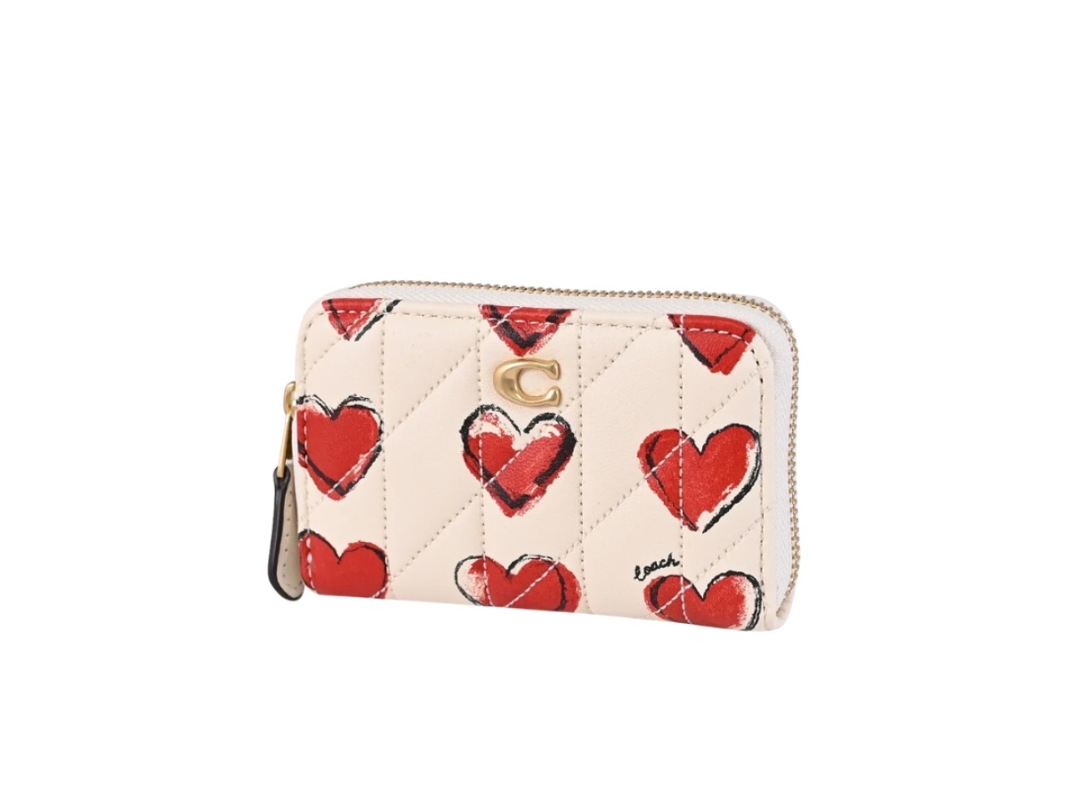 https://d2cva83hdk3bwc.cloudfront.net/cbr71-b4cah-coach-essential-small-zip-around-card-case-with-quilting-and-heart-print-chalk-2.jpg