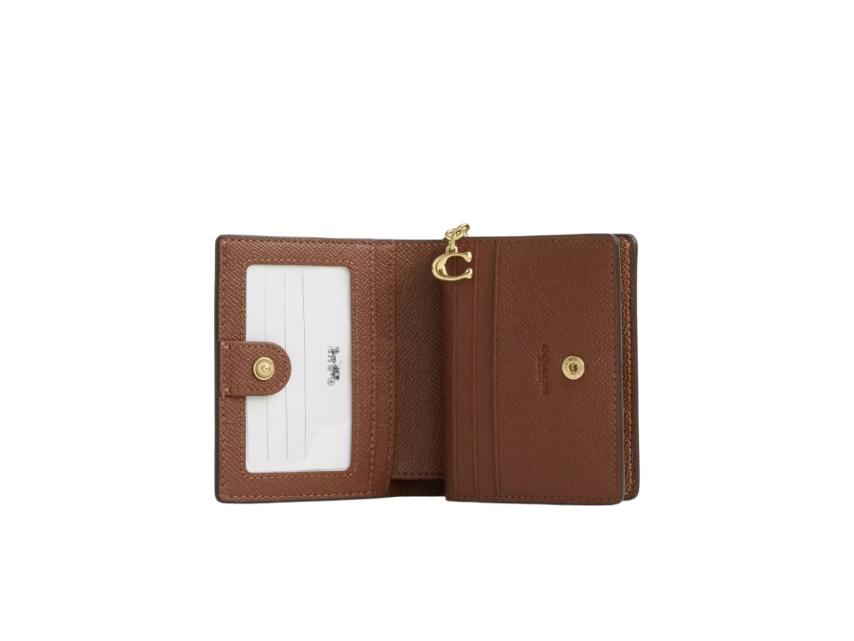 https://d2cva83hdk3bwc.cloudfront.net/ccl96-imygq-coach-snap-wallet-in-signature-canvas-brown-copper-2.jpg