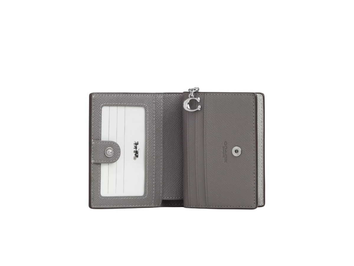 https://d2cva83hdk3bwc.cloudfront.net/ccl96-svygp-coach-snap-wallet-in-signature-canvas-gray-silver-2.jpg