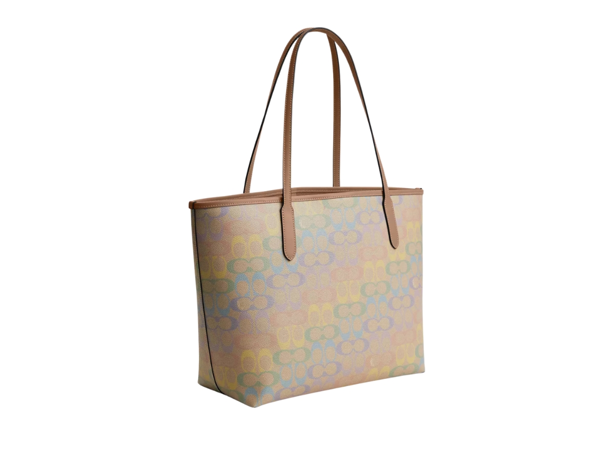https://d2cva83hdk3bwc.cloudfront.net/cda93-svsas-coach-city-tote-bag-in-rainbow-signature-canvas-sand-2.jpg