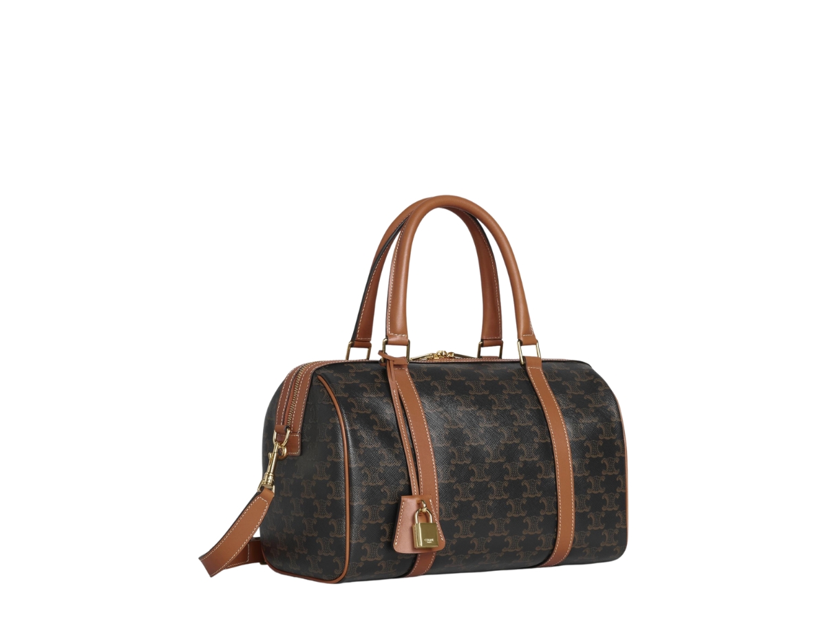 https://d2cva83hdk3bwc.cloudfront.net/celine-boston-bag-in-triomphe-canvas-and-calfskin-with-gold-finishing-hardware-tan-2.jpg