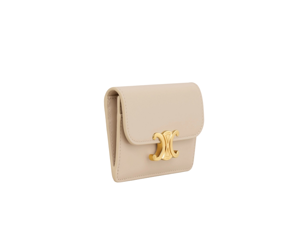 https://d2cva83hdk3bwc.cloudfront.net/celine-card-holder-with-flap-triomphe-in-shiny-calfskin-with-gold-finishing-nude-2.jpg
