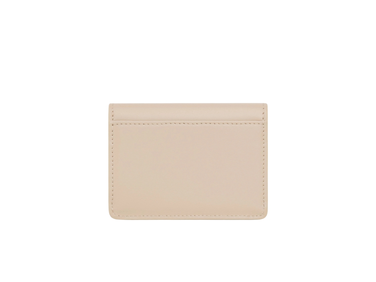 https://d2cva83hdk3bwc.cloudfront.net/celine-card-holder-with-flap-triomphe-in-shiny-calfskin-with-gold-finishing-nude-3.jpg