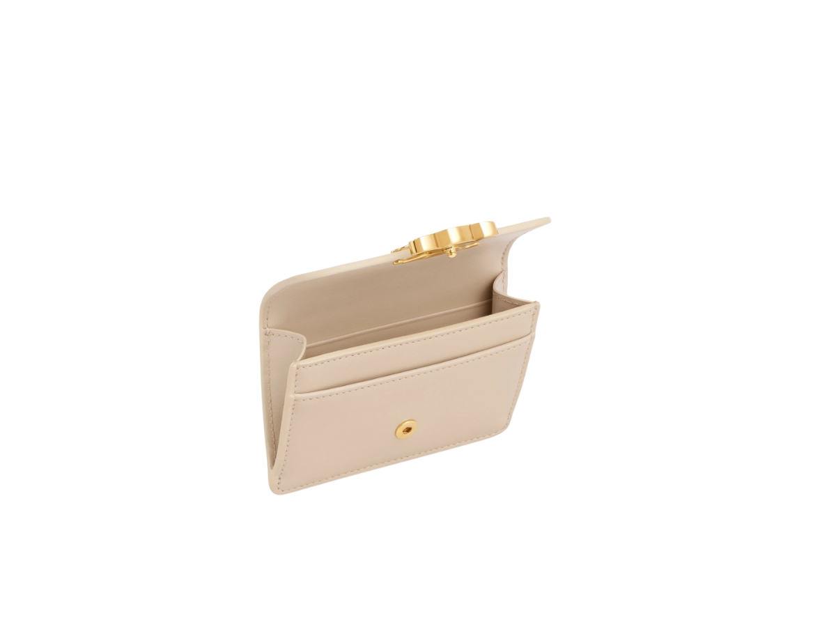 https://d2cva83hdk3bwc.cloudfront.net/celine-card-holder-with-flap-triomphe-in-shiny-calfskin-with-gold-finishing-nude-4.jpg