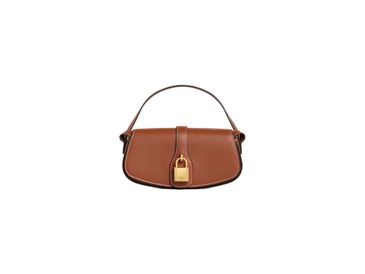 https://d2cva83hdk3bwc.cloudfront.net/celine-clutch-on-strap-tabou-in-smooth-calfskin-tan--1.jpg