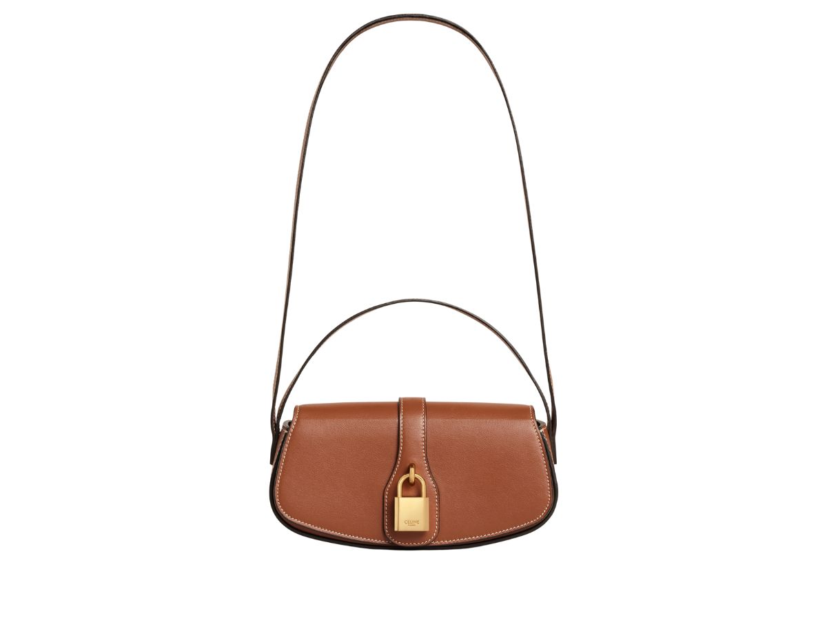 https://d2cva83hdk3bwc.cloudfront.net/celine-clutch-on-strap-tabou-in-smooth-calfskin-tan--3.jpg
