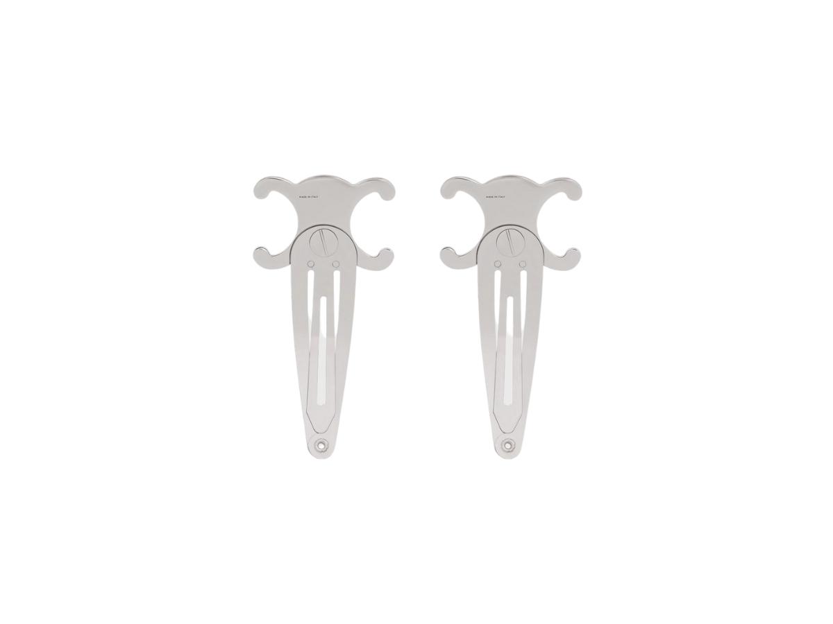 https://d2cva83hdk3bwc.cloudfront.net/celine-hair-accessories-set-of-2-triomphe-snap-hair-clips-in-brass-with-rhodium-finish-and-steel-silver-2.jpg