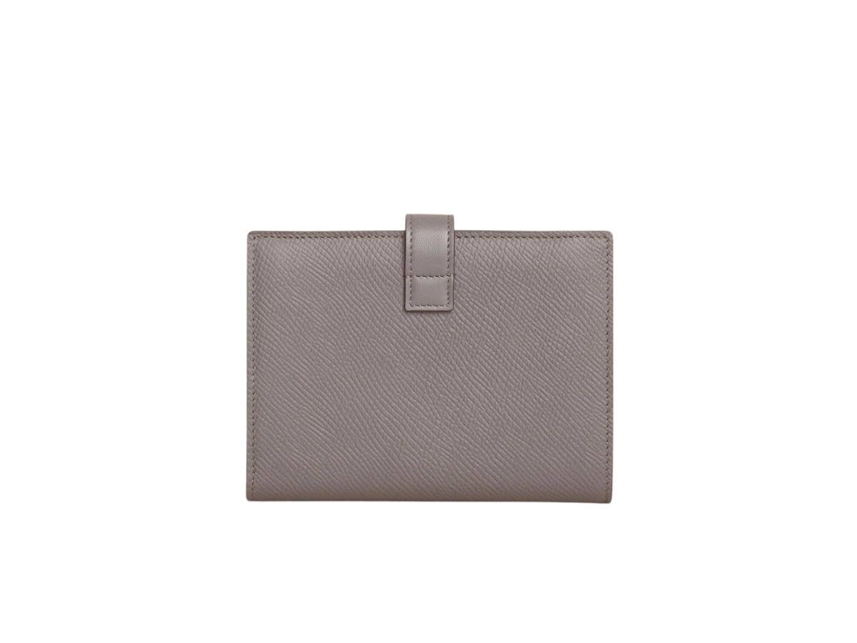 https://d2cva83hdk3bwc.cloudfront.net/celine-medium-strap-wallet-in-grained-calfskin-with-gold-finishing-hardware-pebble-3.jpg