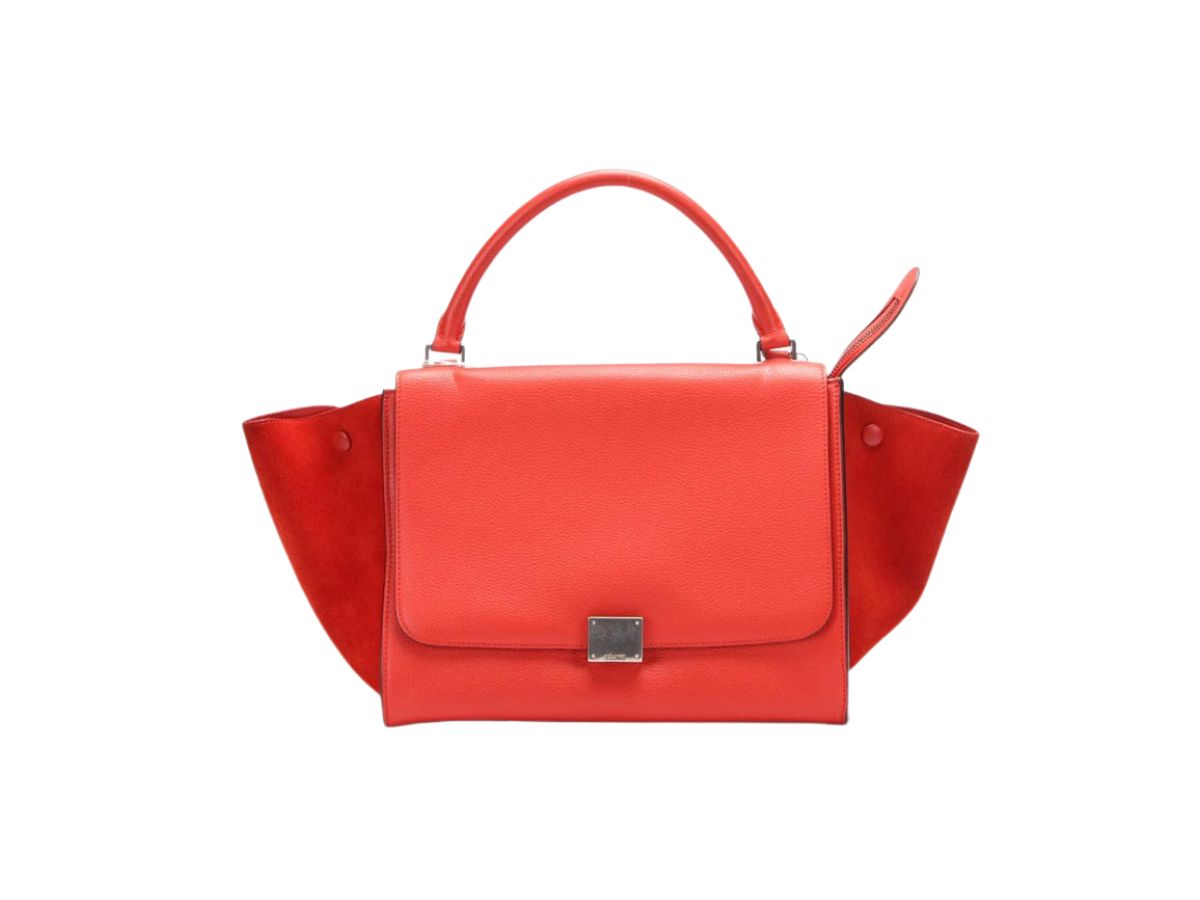 https://d2cva83hdk3bwc.cloudfront.net/celine-medium-trapeze-bag-orange-2.jpg