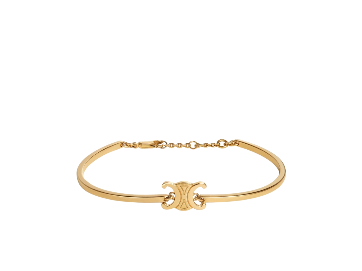 https://d2cva83hdk3bwc.cloudfront.net/celine-triomphe-articulated-bracelet-in-brass-with-gold-finish-gold-1.jpg