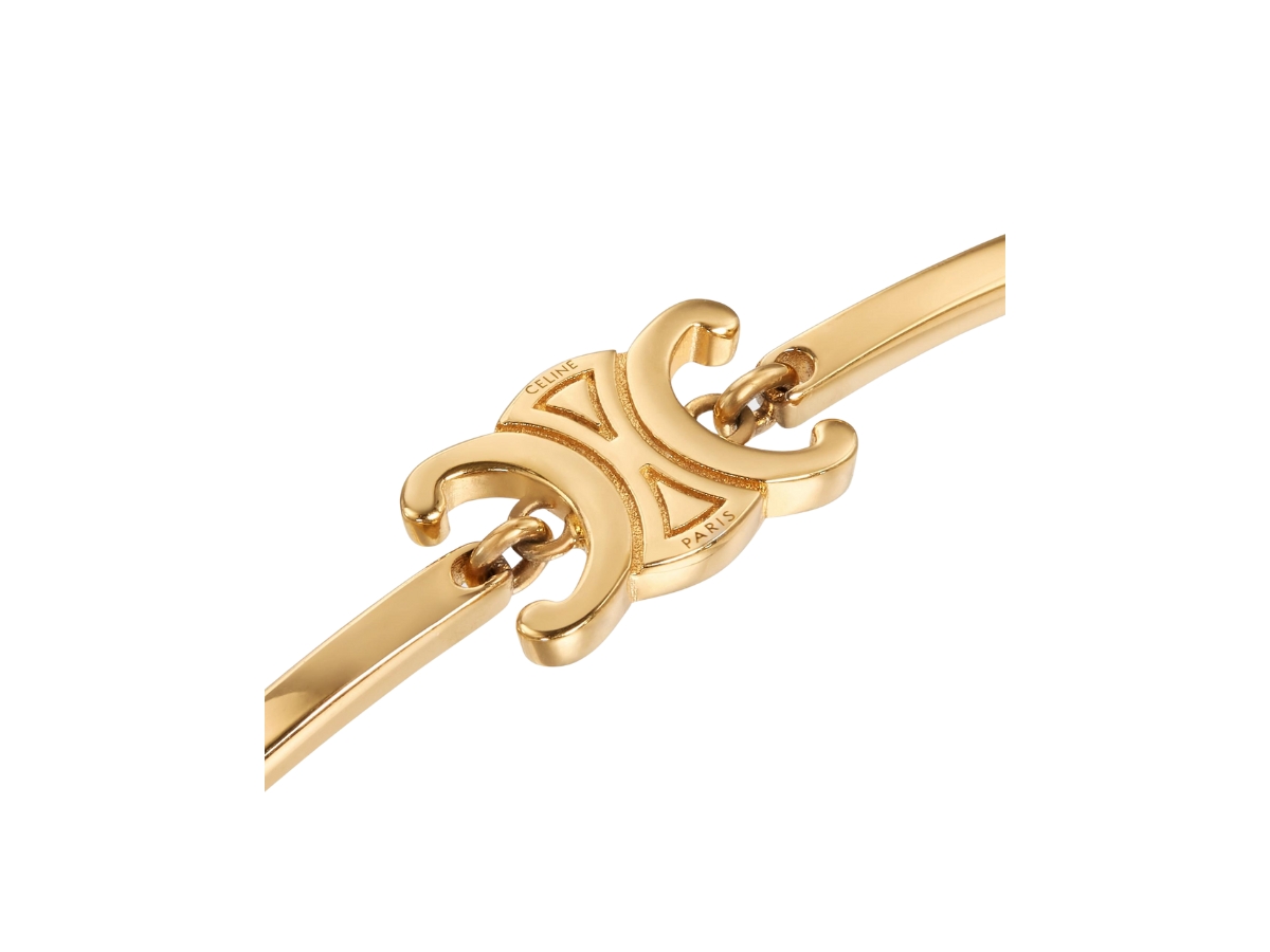https://d2cva83hdk3bwc.cloudfront.net/celine-triomphe-articulated-bracelet-in-brass-with-gold-finish-gold-2.jpg