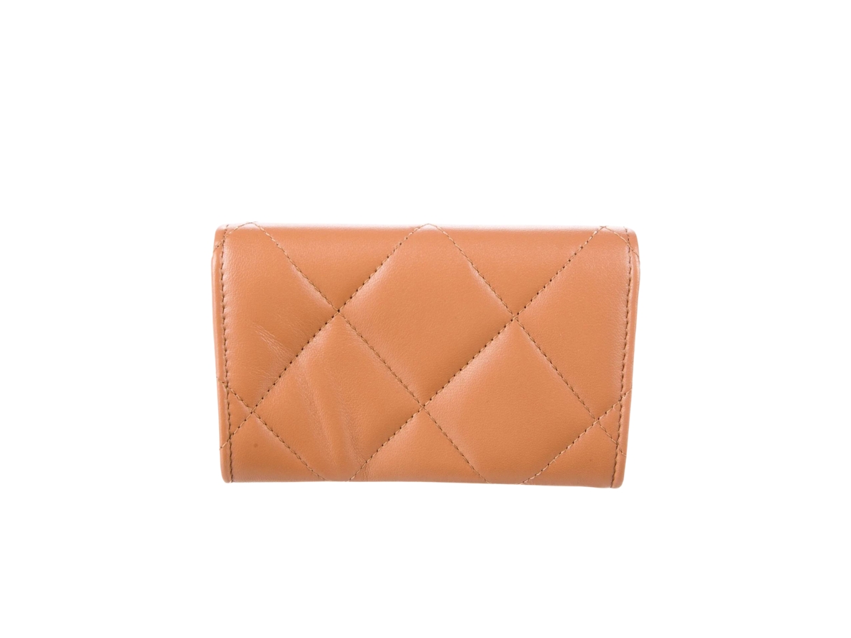 https://d2cva83hdk3bwc.cloudfront.net/chanel-19-flap-card-holder-in-lambskin-with-gold-metal-hardware-beige-2.jpg