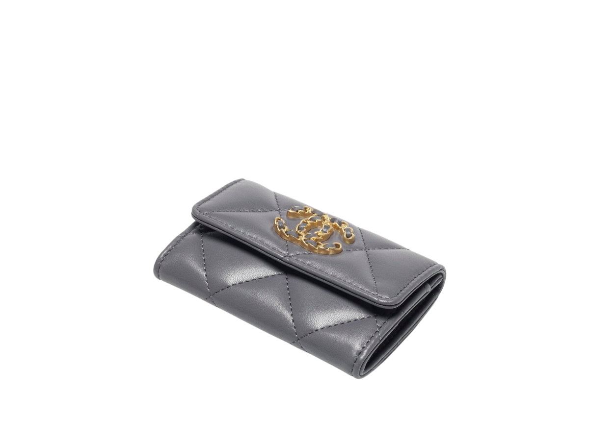https://d2cva83hdk3bwc.cloudfront.net/chanel-19-flap-card-holder-in-shiny-lambskin-with-gold-silver-ruthenium-fins-metal-hardware-grey-2.jpg