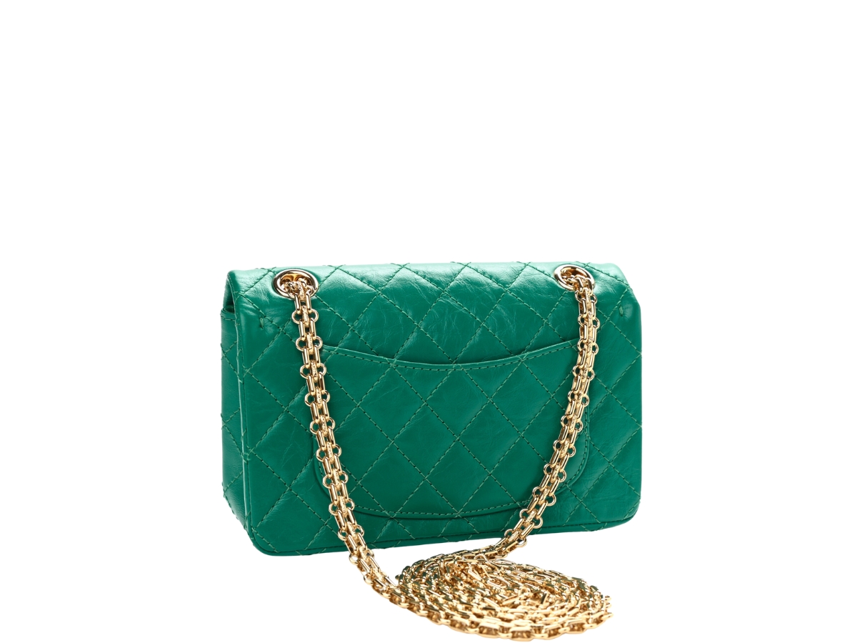https://d2cva83hdk3bwc.cloudfront.net/chanel-2-55-reissue-in-aged-calfskin-with-gold-gold-hardware-dark-green-2.jpg