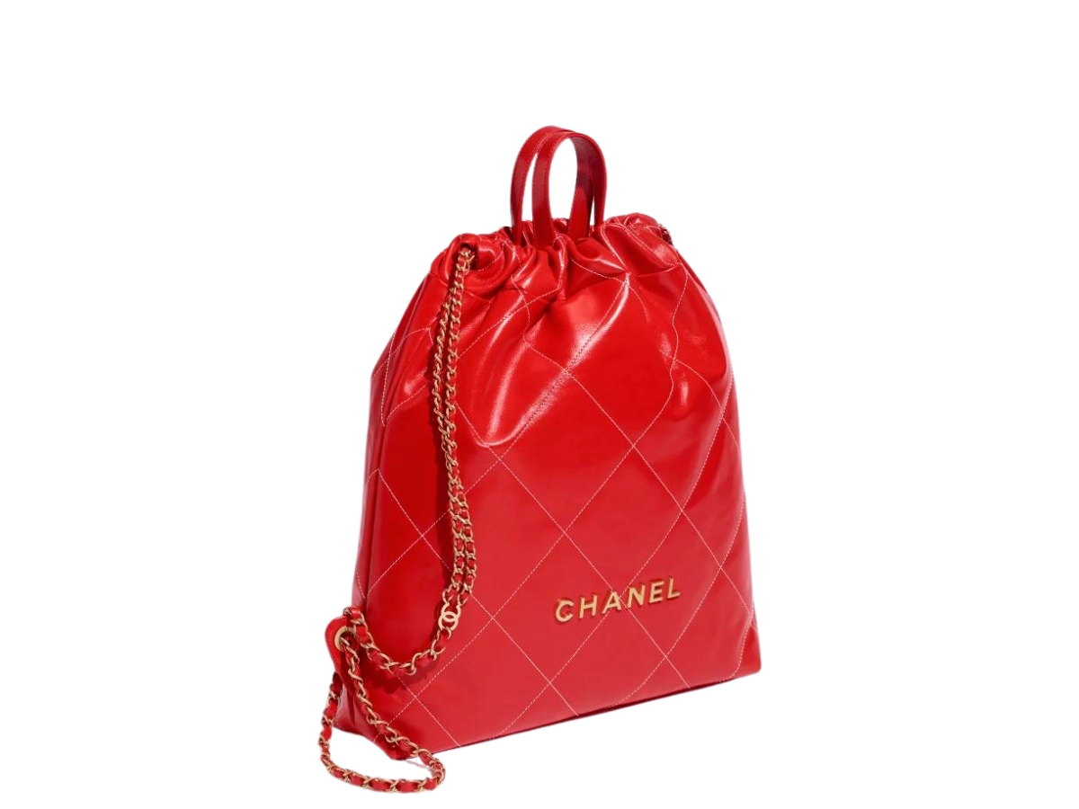 https://d2cva83hdk3bwc.cloudfront.net/chanel-22-backpack-in-shiny-calfskin-with-gold-tone-metal-red-and-white-2.jpg