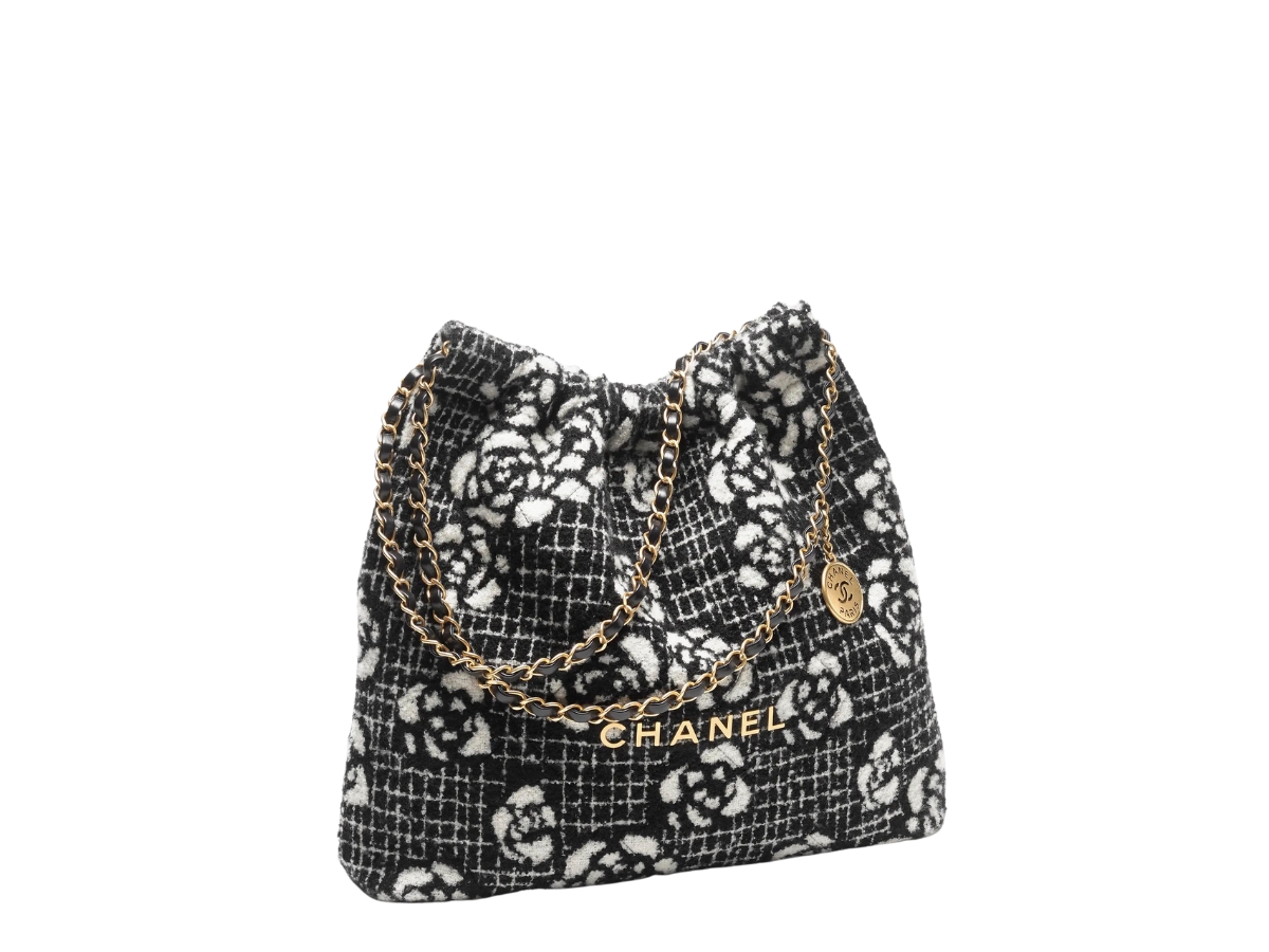 https://d2cva83hdk3bwc.cloudfront.net/chanel-22-handbag-in-cashmere-jacquard-with-gold-tone-metal-hardware-2.jpg