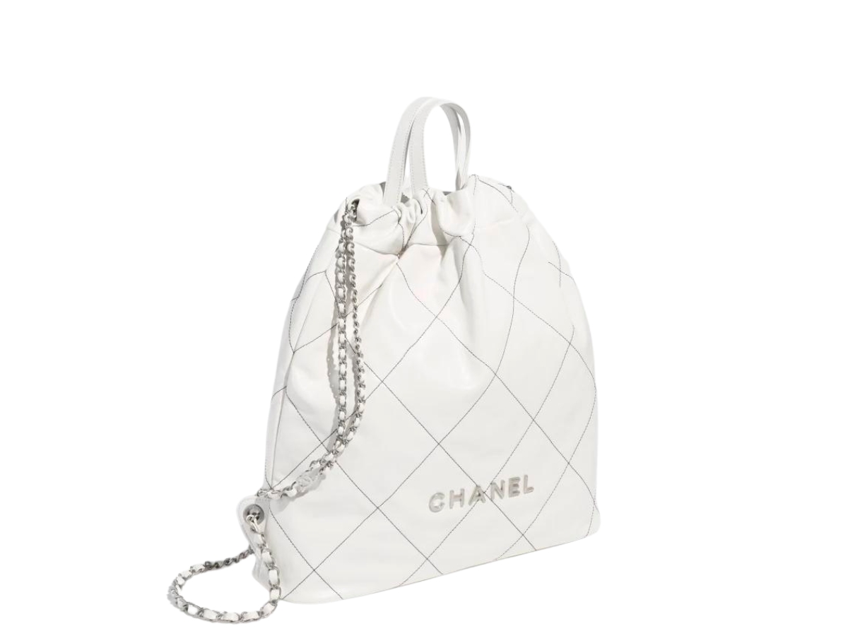https://d2cva83hdk3bwc.cloudfront.net/chanel-22-large-backpack-in-shiny-calfskin-with-silver-tone-metal-white-and-black-2.jpg