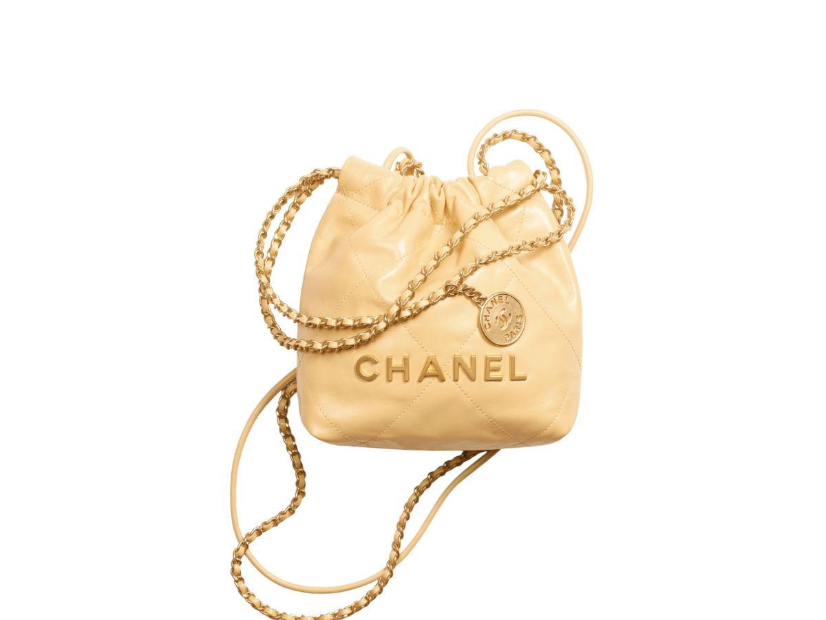 https://d2cva83hdk3bwc.cloudfront.net/chanel-22-mini-handbag-in-shiny-calfskin-with-gold-tone-metal-yellow-3.jpg