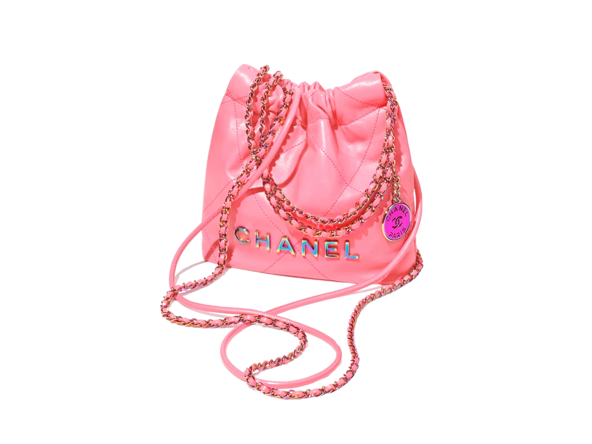 https://d2cva83hdk3bwc.cloudfront.net/chanel-22-mini-handbag-in-shiny-calfskin-with-rainbow-metal-hardware-coral-pink-2.jpg