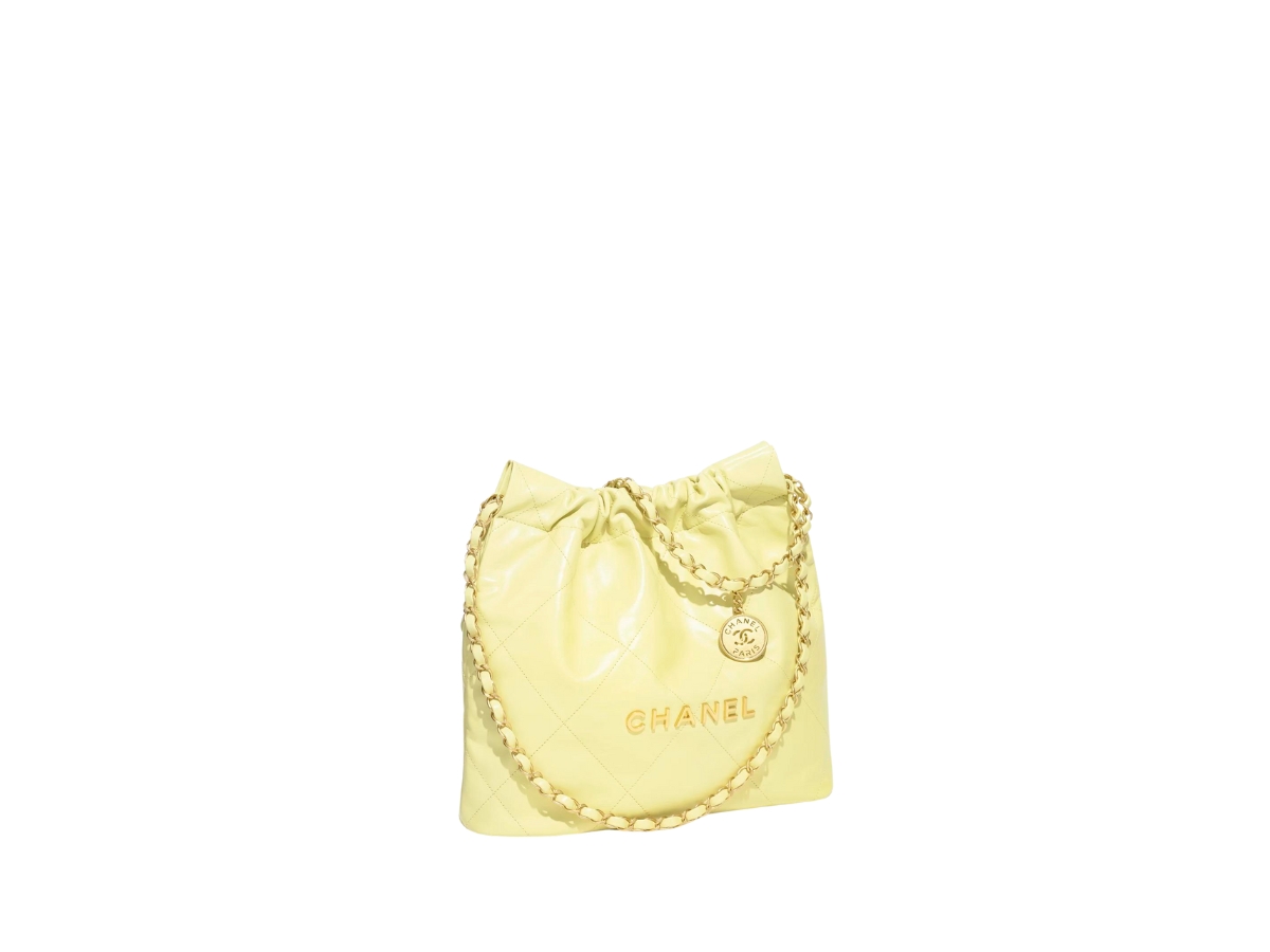 https://d2cva83hdk3bwc.cloudfront.net/chanel-22-small-handbag-in-shiny-calfskin-with-gold-tone-metal-yellow-2.jpg