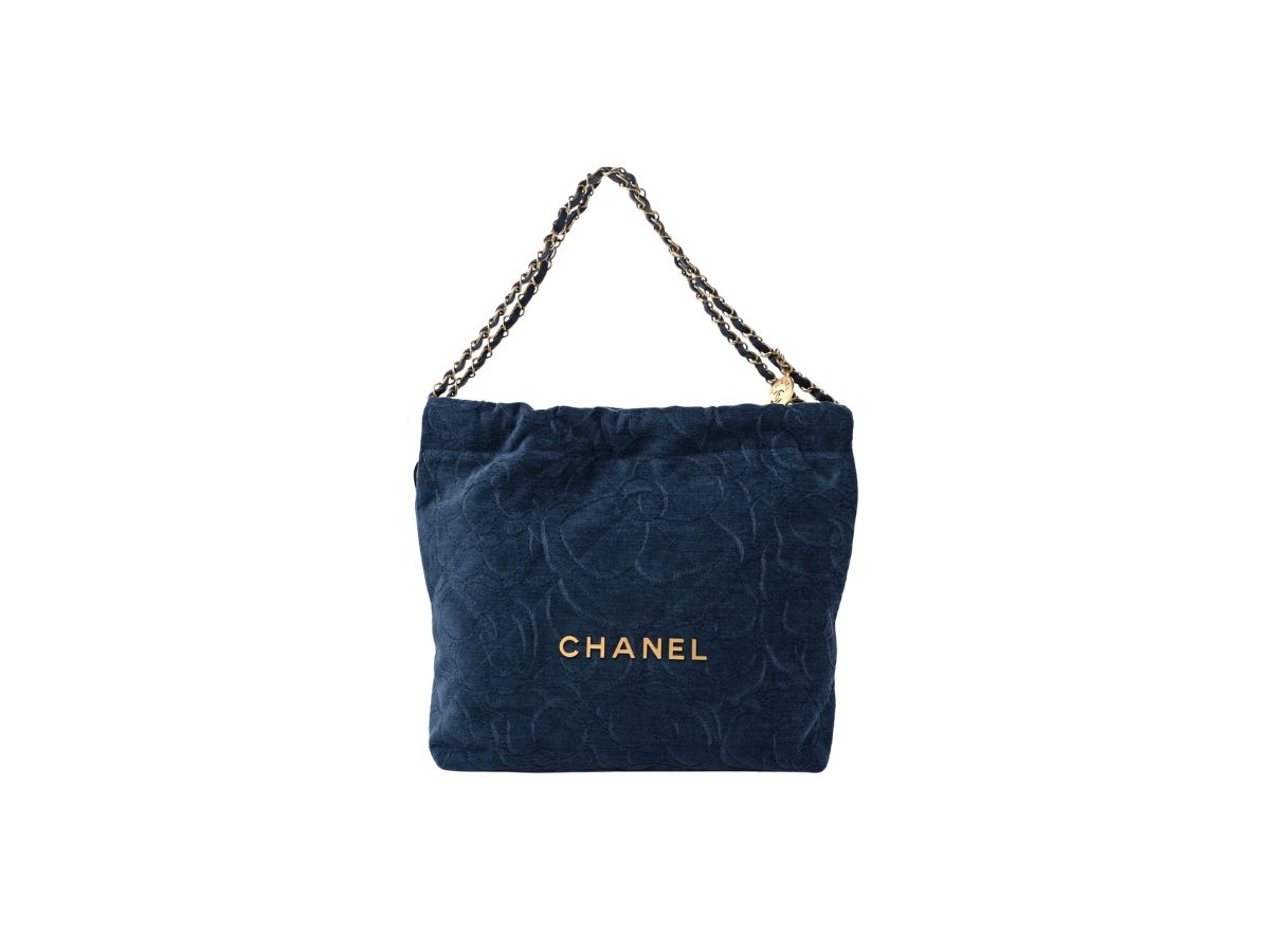 https://d2cva83hdk3bwc.cloudfront.net/chanel-22-small-handbag-in-velvet-camellia-with-gold-tone-metal-dark-blue-2.jpg