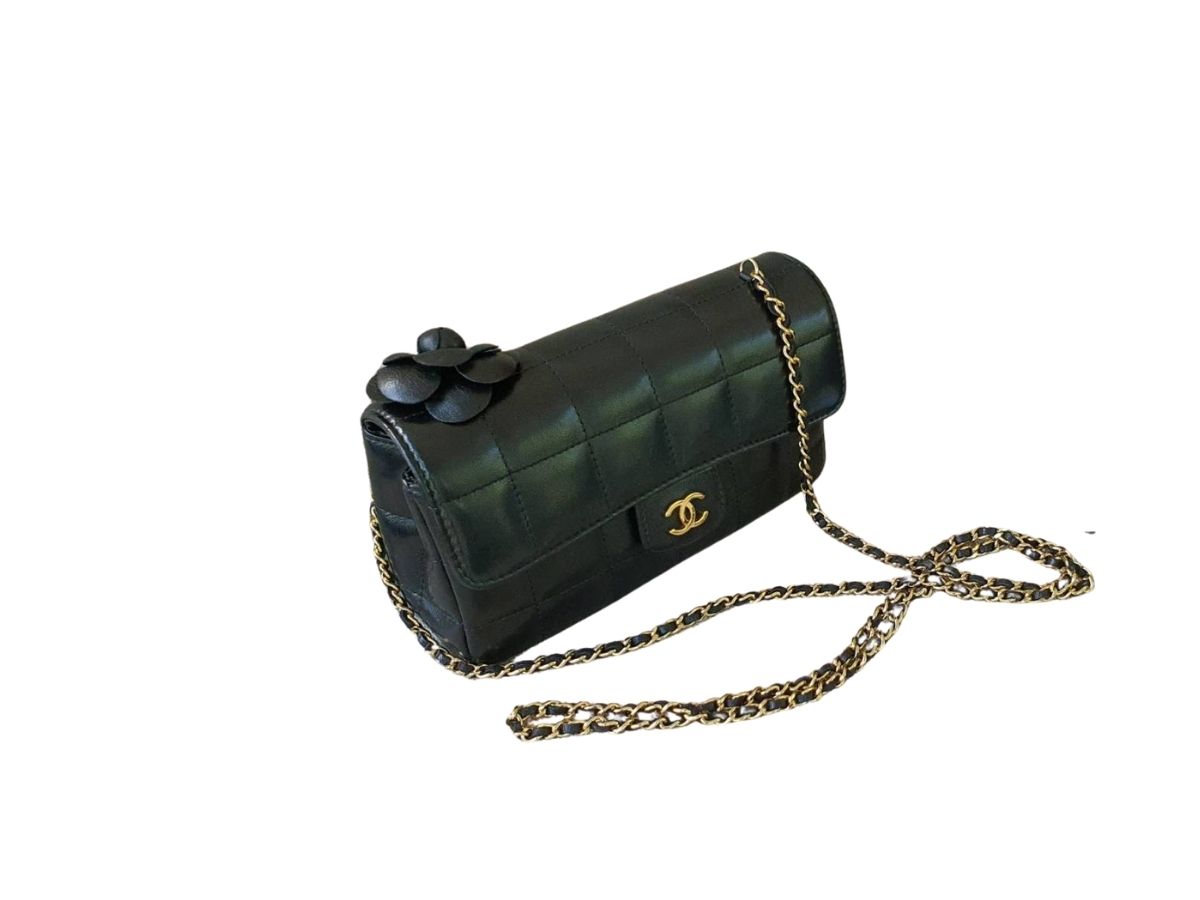 https://d2cva83hdk3bwc.cloudfront.net/chanel-black-chocolate-bar-leather-camellia-mini-flap-bag-2.jpg