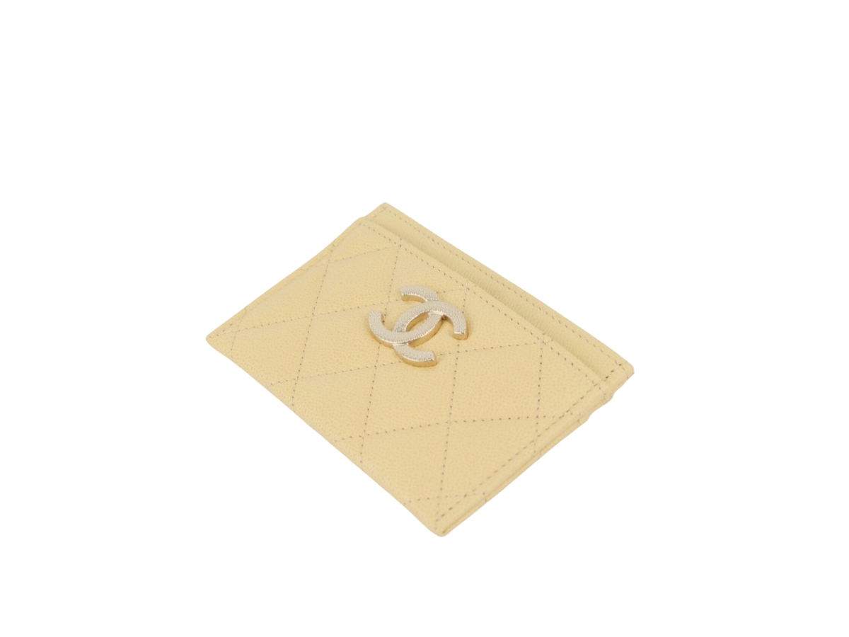 https://d2cva83hdk3bwc.cloudfront.net/chanel-card-holder-wallet-in-calfskin-with-gold-hardware-yellow-3.jpg