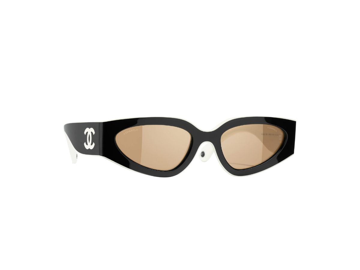 https://d2cva83hdk3bwc.cloudfront.net/chanel-cat-eye-sunglasses-in-nylon-black-and-white-with-beige-lenses-1.jpg