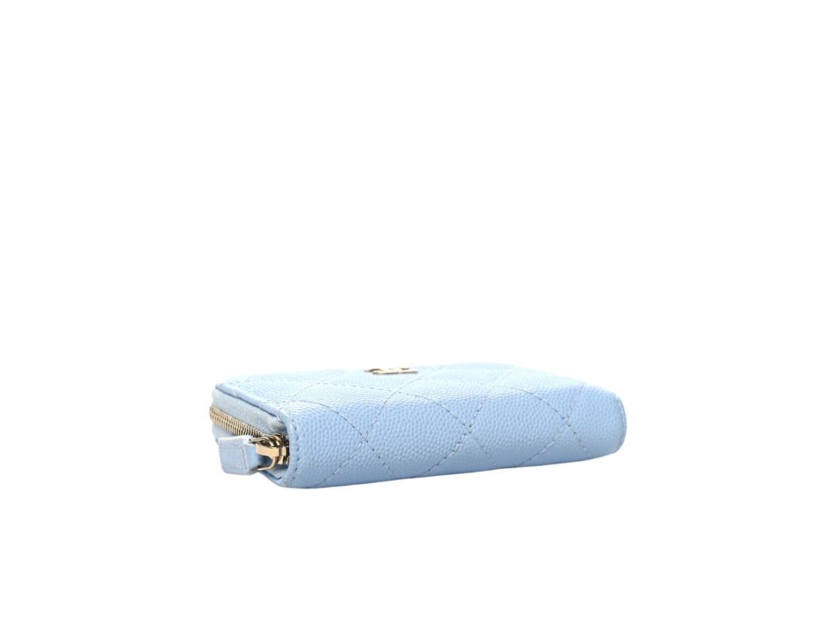 https://d2cva83hdk3bwc.cloudfront.net/chanel-caviar-quilted-zip-coin-in-grained-shiny-calfskin-with-gold-hardware-purse-light-blue-3.jpg