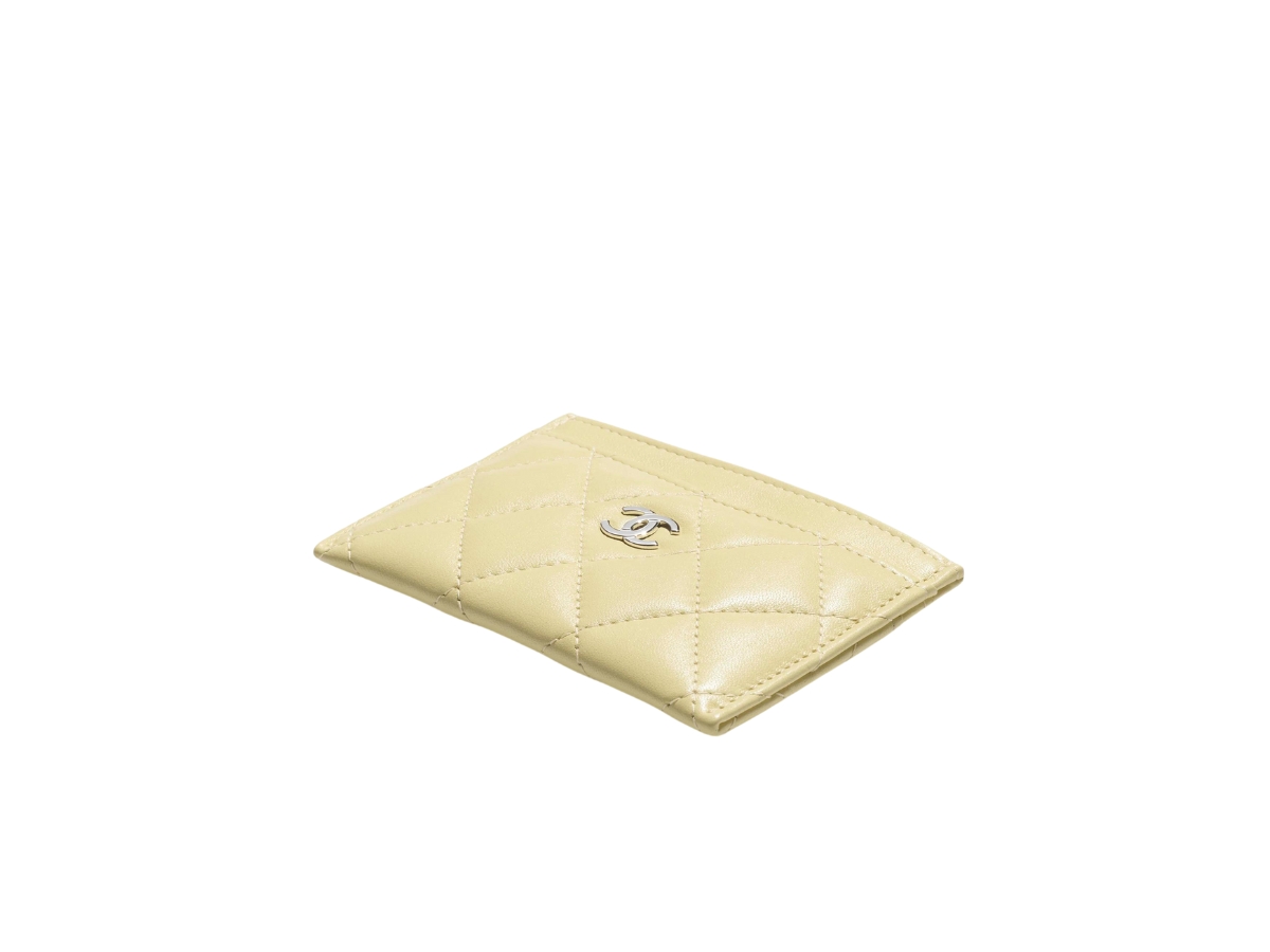 https://d2cva83hdk3bwc.cloudfront.net/chanel-classic-card-holder-in-lambskin-with-metal-hardware-yellow-2.jpg