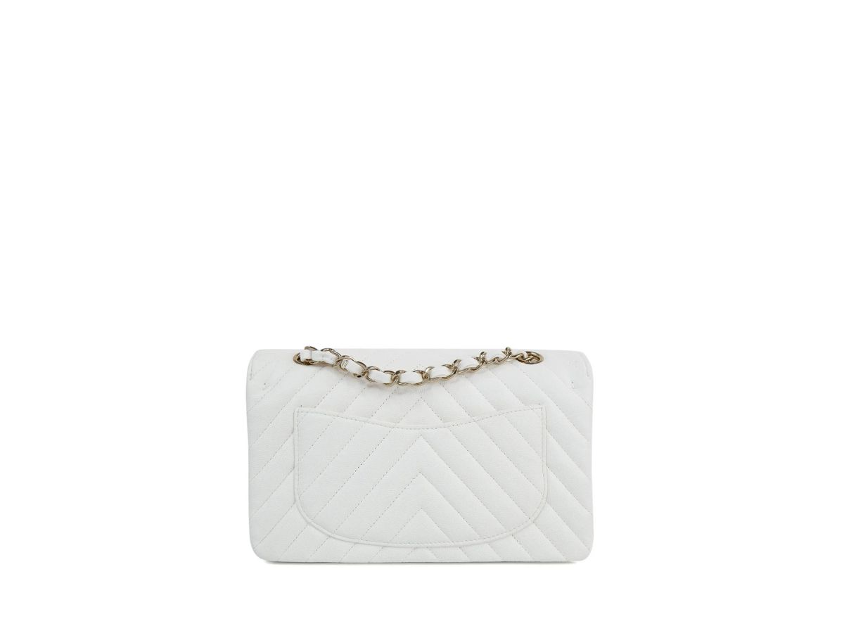 https://d2cva83hdk3bwc.cloudfront.net/chanel-classic-handbag-9-in-chevron-calfskin-wuth-gold-finish-hardware-white-2.jpg