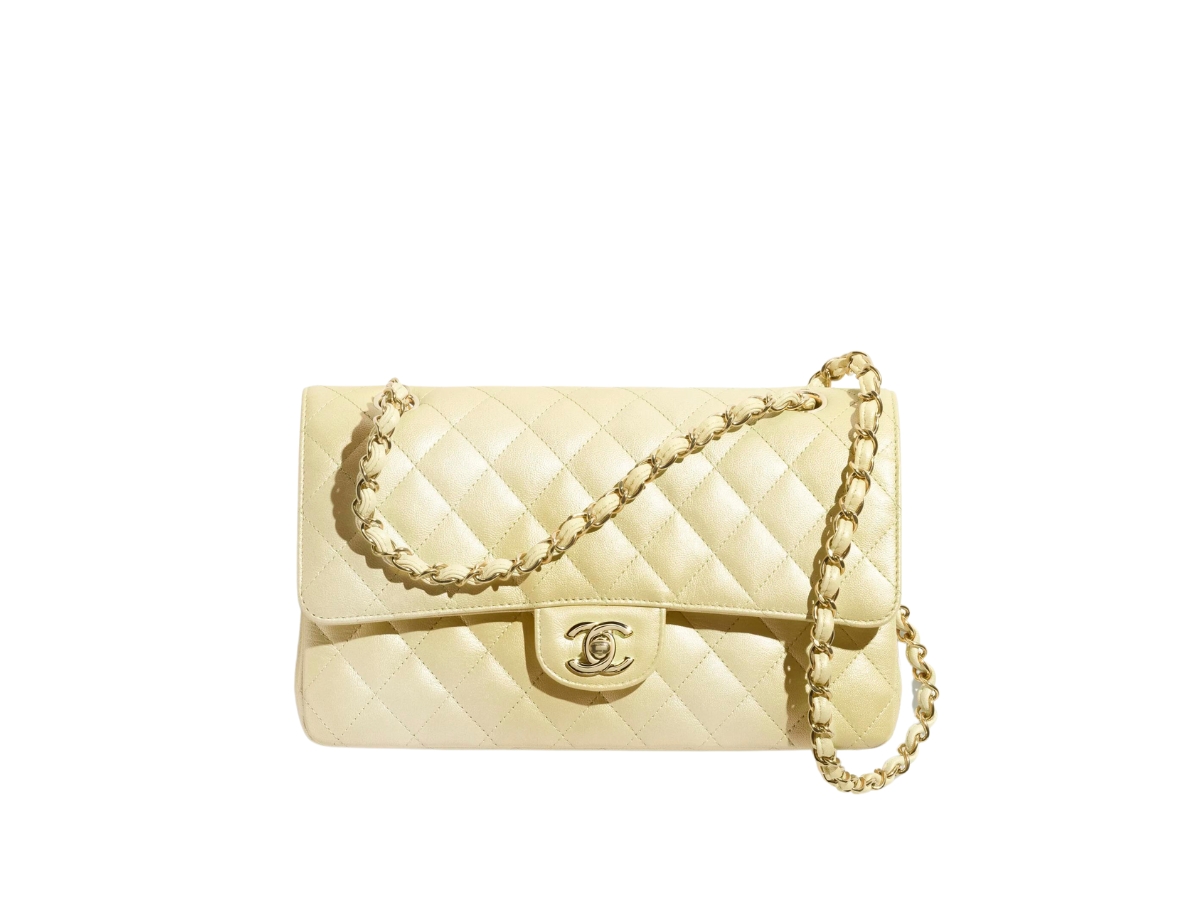 https://d2cva83hdk3bwc.cloudfront.net/chanel-classic-handbag-in-cloudy-pearly-goatskin-with-gold-tone-metal-hardware-light-yellow-1.jpg