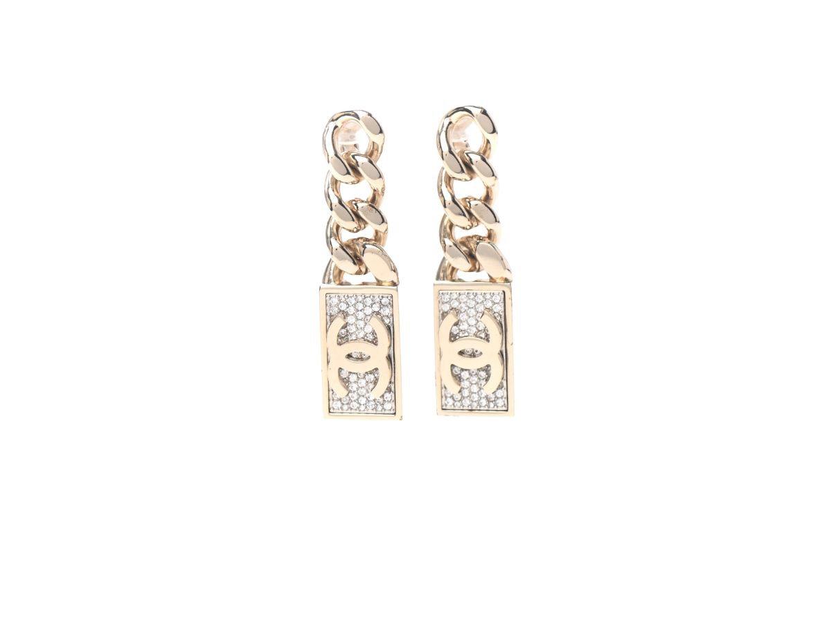 https://d2cva83hdk3bwc.cloudfront.net/chanel-crystal-dog-tag-charm-clip-on-earrings-gold-in-gold-metal-with-crystal--1.jpg