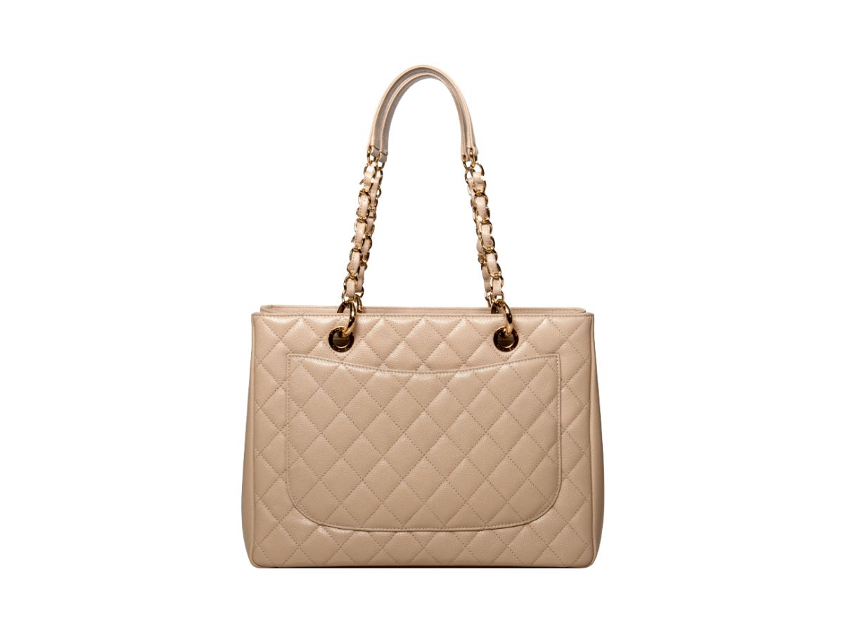 https://d2cva83hdk3bwc.cloudfront.net/chanel-grand-shopping-tote-beige-2.jpg