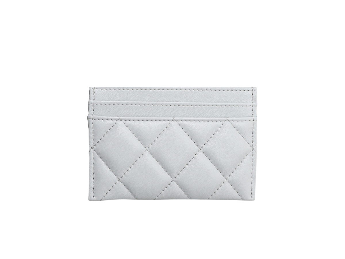 https://d2cva83hdk3bwc.cloudfront.net/chanel-heart-card-holders-in-grained-calfskin-with-gold-hardware-light-blue-2.jpg