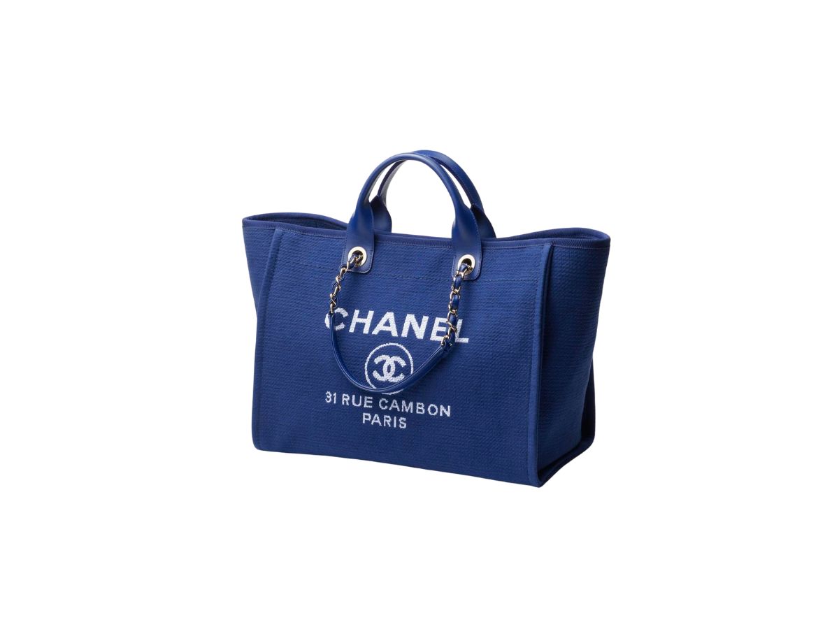 https://d2cva83hdk3bwc.cloudfront.net/chanel-large-tote-in-mixed-fibres-and-calfskin-with-gold-tone-metal-blue-3.jpg