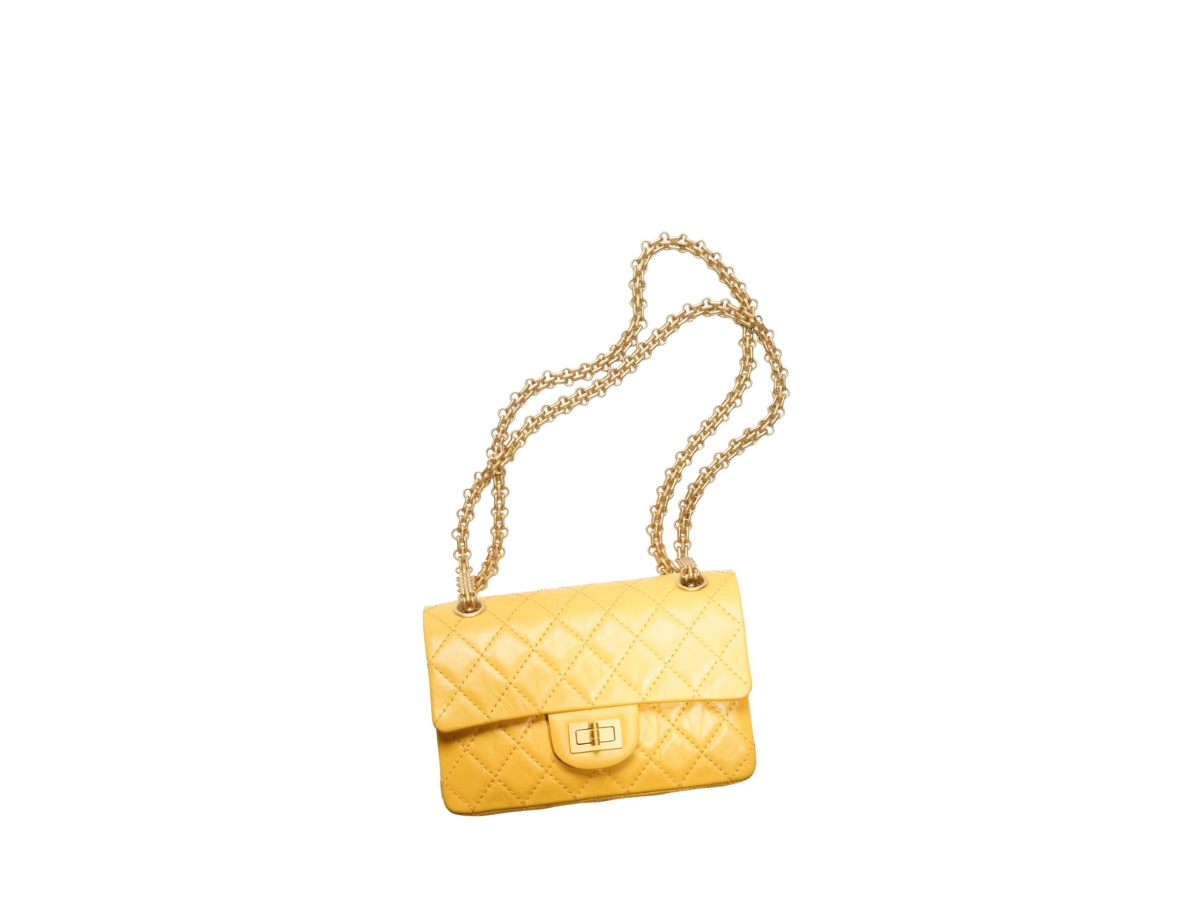 https://d2cva83hdk3bwc.cloudfront.net/chanel-mini-2-55-handbag-in-aged-calfskin-with-gold-tone-metal-hardware-yellow-3.jpg