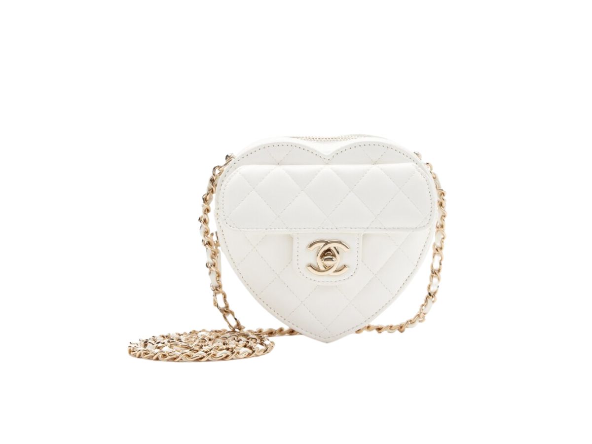 https://d2cva83hdk3bwc.cloudfront.net/chanel-mini-heart-clutch-with-chain-in-lambskin-leather-with-gold-tone-hardware-white-1.jpg