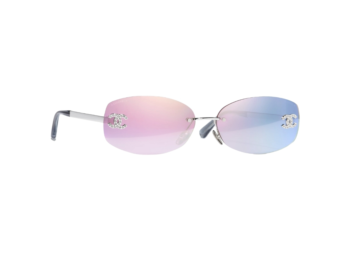 https://d2cva83hdk3bwc.cloudfront.net/chanel-oval-sunglasses-in-silver-metal-with-pink-mirror-lenses-cc-logo-detailing-1.jpg