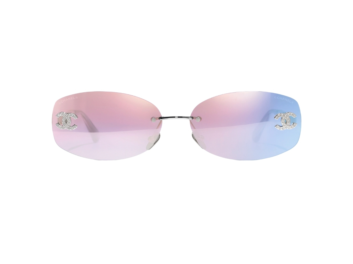 https://d2cva83hdk3bwc.cloudfront.net/chanel-oval-sunglasses-in-silver-metal-with-pink-mirror-lenses-cc-logo-detailing-2.jpg