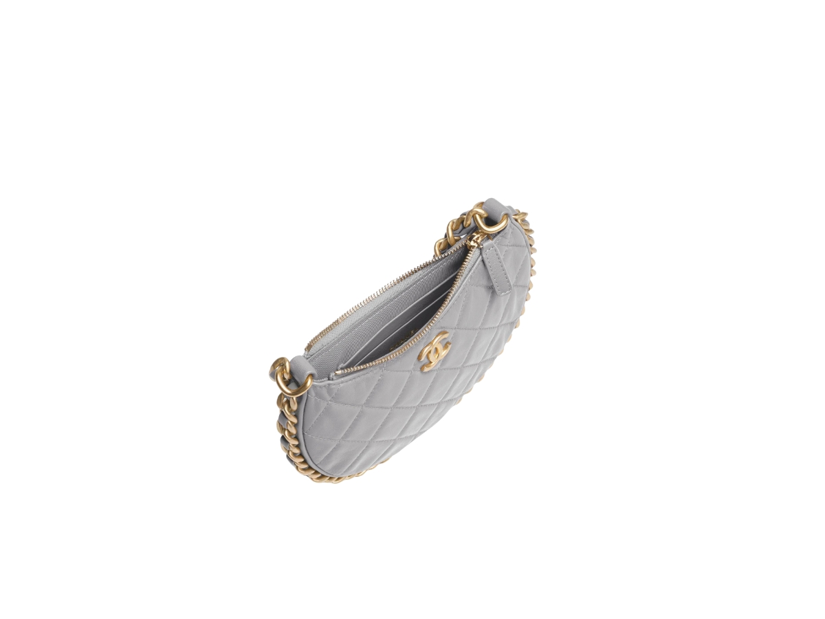 https://d2cva83hdk3bwc.cloudfront.net/chanel-pouch-in-shiny-crumpled-lambskin-with-gold-tone-metal-hardware-gray-3.jpg