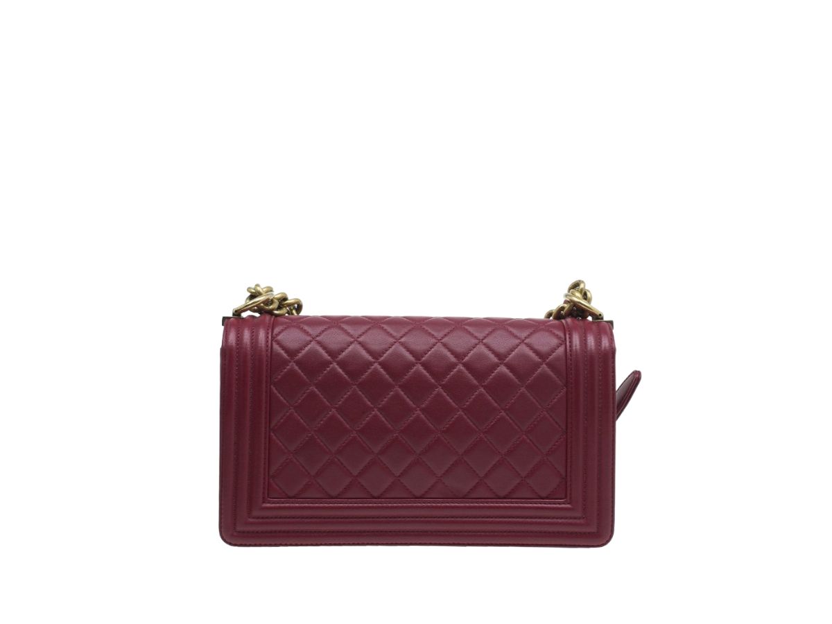 https://d2cva83hdk3bwc.cloudfront.net/chanel-quilted-leather-medium-boy-bag-red-2.jpg