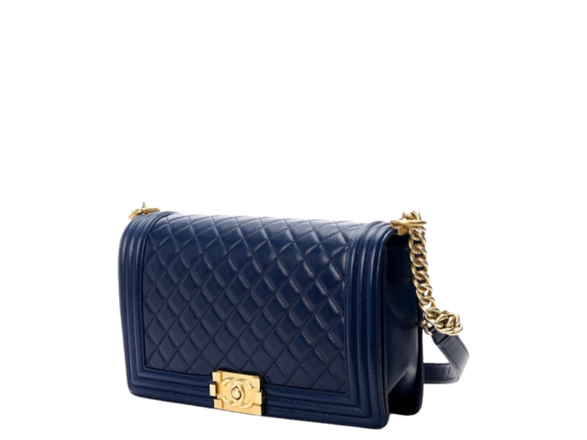 https://d2cva83hdk3bwc.cloudfront.net/chl-sbbcmbfilwshdnb-chanel-medium-boy-flap-in-lambskin-with-silver-hardware-dark-navy-blue-2.jpg
