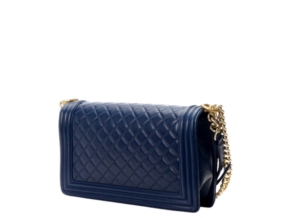 https://d2cva83hdk3bwc.cloudfront.net/chl-sbbcmbfilwshdnb-chanel-medium-boy-flap-in-lambskin-with-silver-hardware-dark-navy-blue-3.jpg