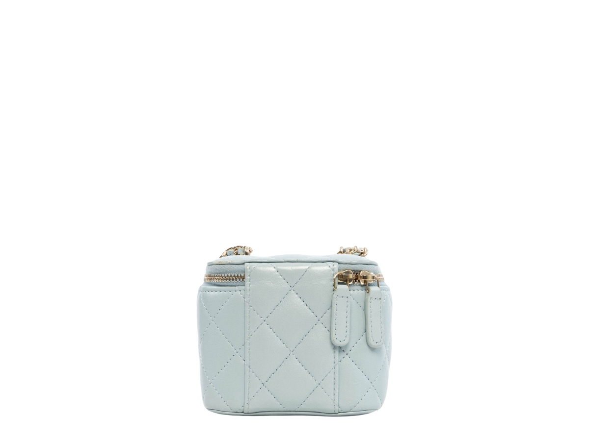 https://d2cva83hdk3bwc.cloudfront.net/chl-sbbcmvcighwlb-chanel-mini-vanity-case-in-gold-hardware-with-light-blue-2.jpg