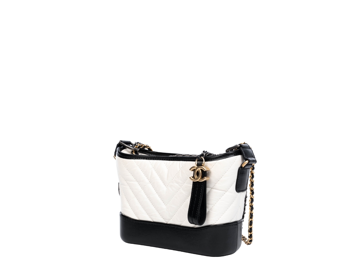 https://d2cva83hdk3bwc.cloudfront.net/chl-sbbcsghighwbw-chanel-small-gabrielle-hobo-in-gold-hardware-with-black-white-2.jpg