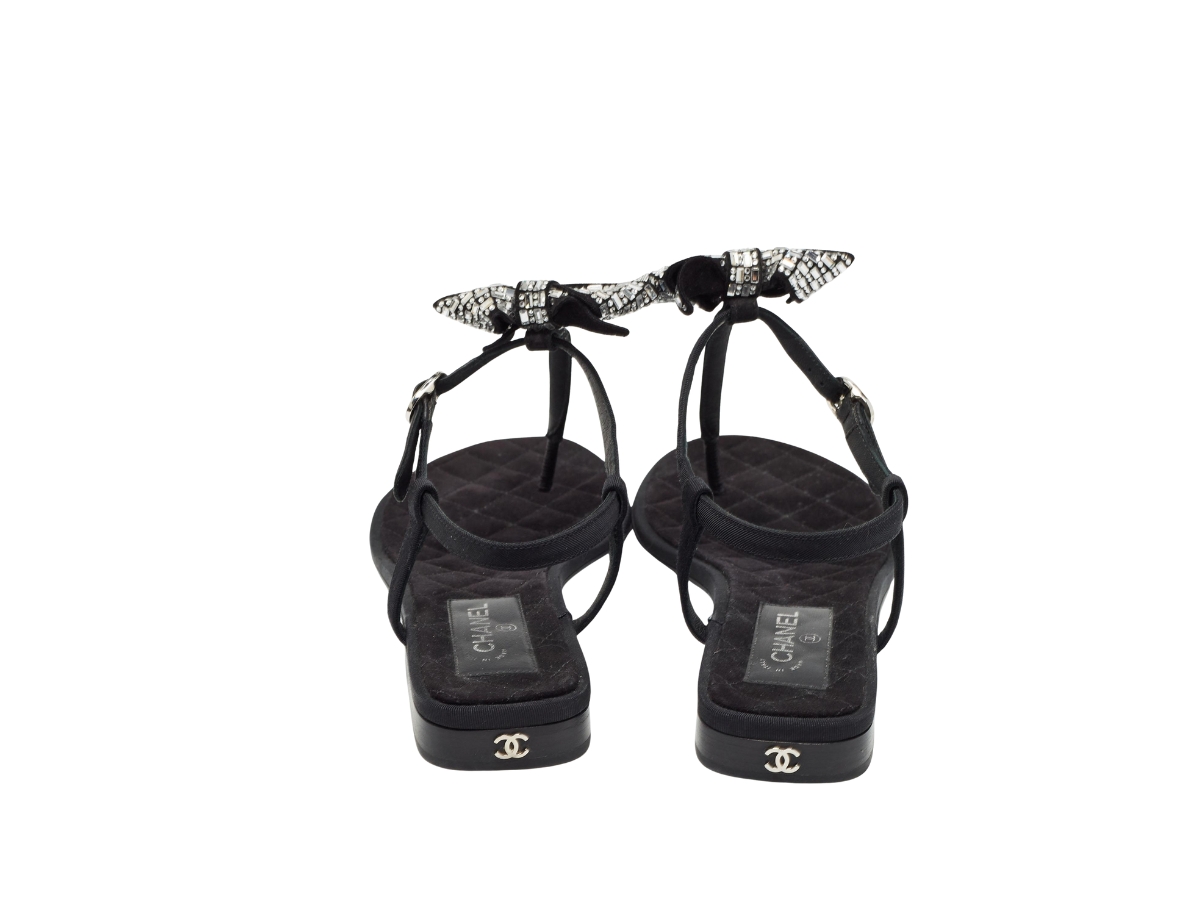https://d2cva83hdk3bwc.cloudfront.net/chl-sdscgvcbtsb-chanel-grosgrain-velvet-crystal-bow-thong-sandals-black-5.jpg