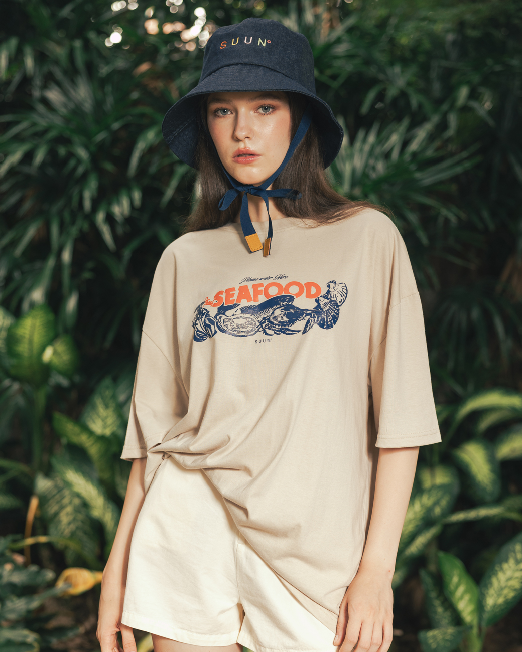 https://d2cva83hdk3bwc.cloudfront.net/classy_suun---oversized-t-shirt--seafood--cream-2.jpg