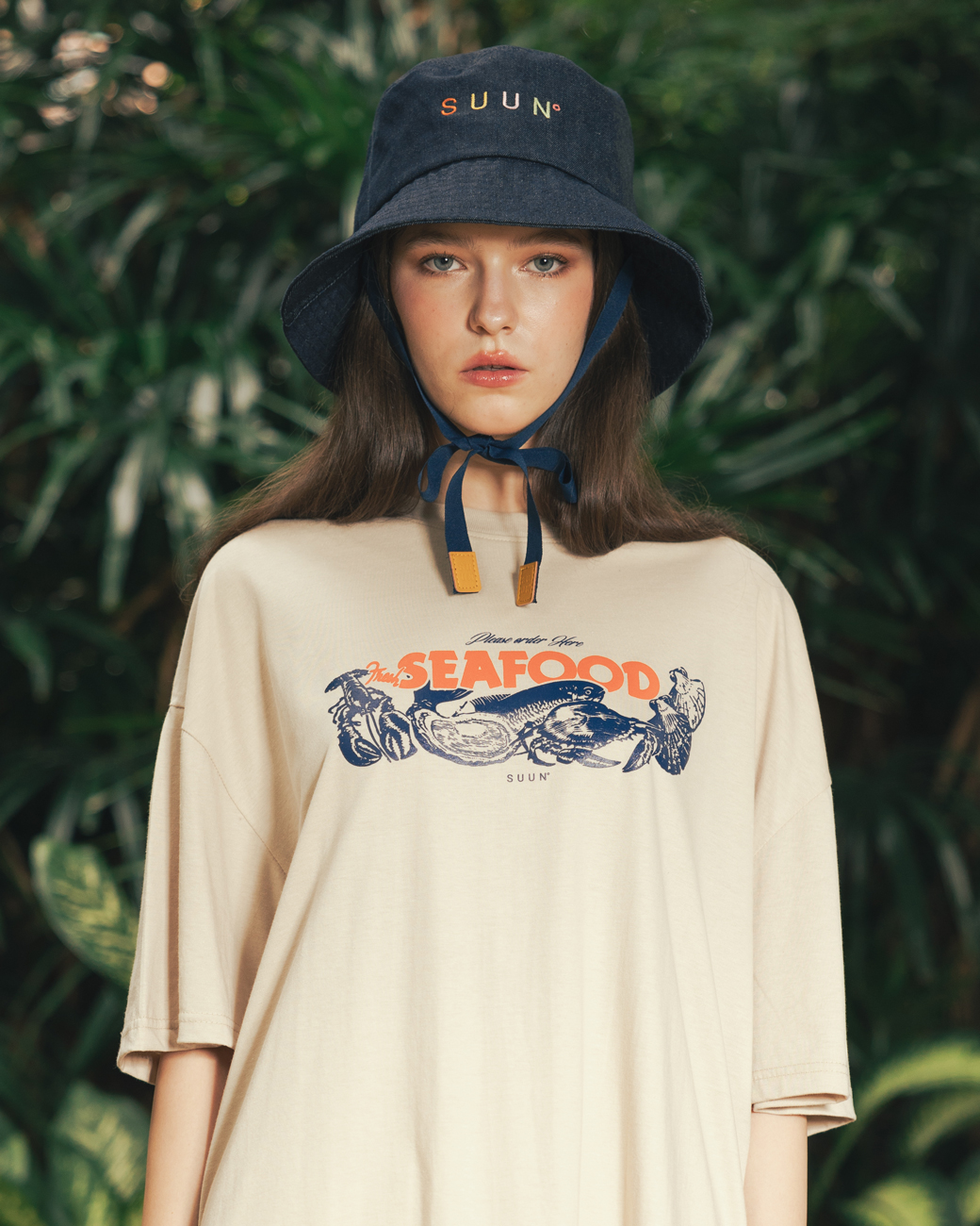 https://d2cva83hdk3bwc.cloudfront.net/classy_suun---oversized-t-shirt--seafood--cream-3.jpg
